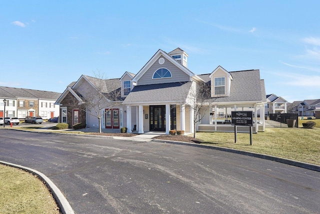 front facade with a front lawn