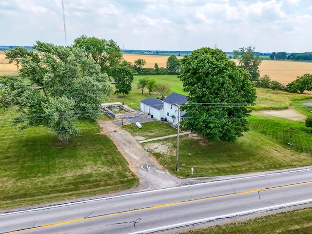 birds eye view of property featuring a rural view