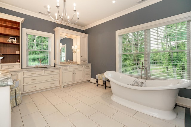 bathroom with tile patterned floors, a wealth of natural light, and a tub