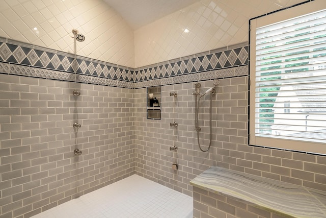 bathroom featuring tiled shower