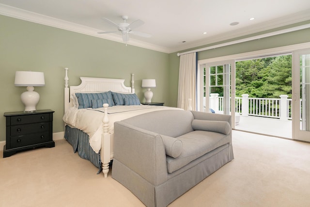 carpeted bedroom with access to exterior, ceiling fan, and ornamental molding