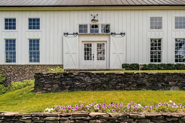 entrance to property featuring french doors