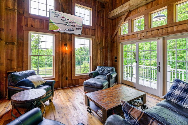 living room featuring plenty of natural light and light hardwood / wood-style floors