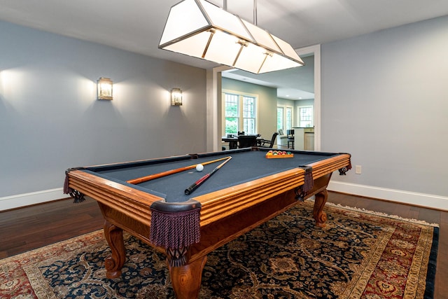 game room featuring dark hardwood / wood-style flooring and pool table