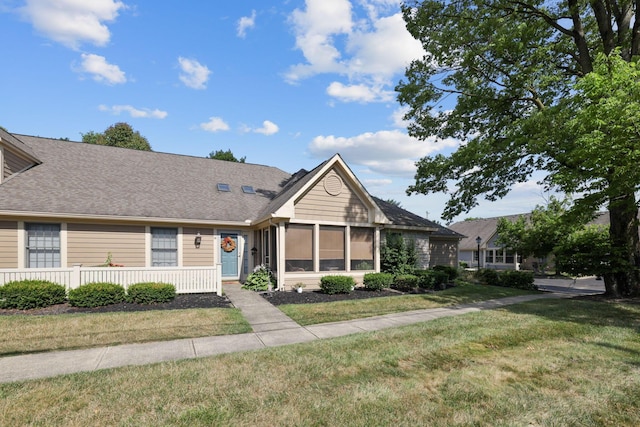 view of front of house with a front lawn