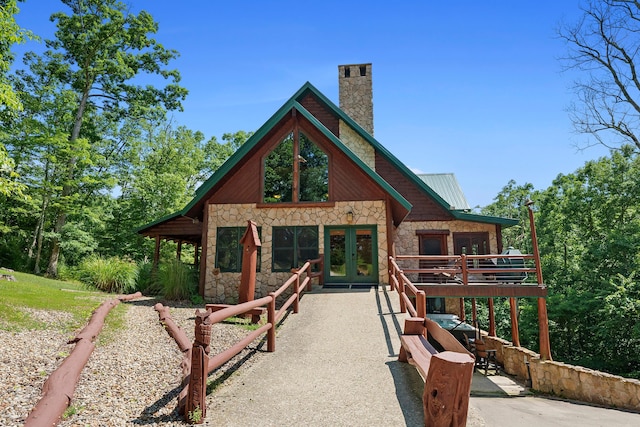 17441 Keister Rd, Laurelville, OH 43135 - view of front of home with stone siding, french doors, and a chimney