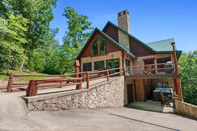 17441 Keister Rd, Laurelville, OH 43135 - chalet / cabin with stone siding, a chimney, and a patio area