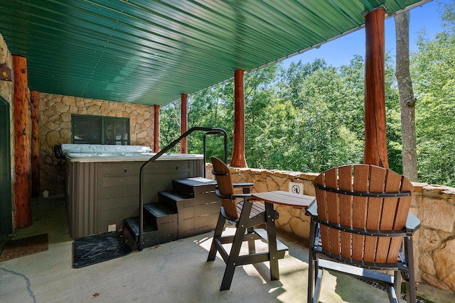 view of patio with a hot tub