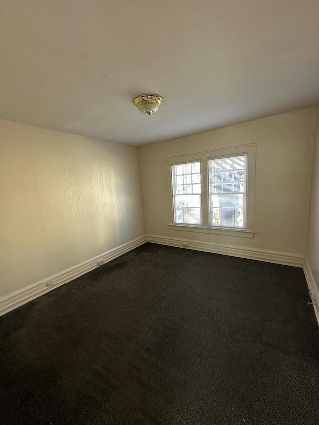 empty room featuring carpet