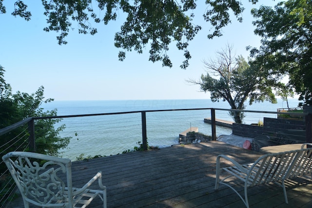 deck featuring a water view