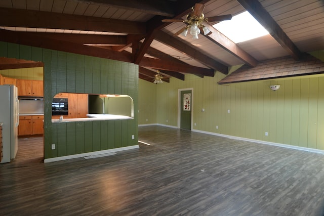 unfurnished living room featuring vaulted ceiling with beams, ceiling fan, and dark wood-type flooring