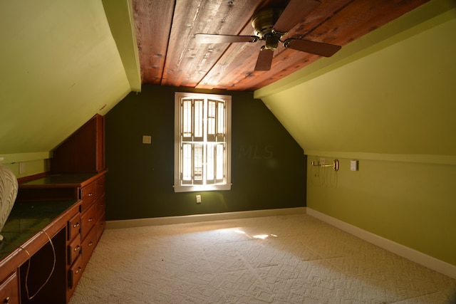 additional living space featuring ceiling fan, light colored carpet, lofted ceiling, and wood ceiling