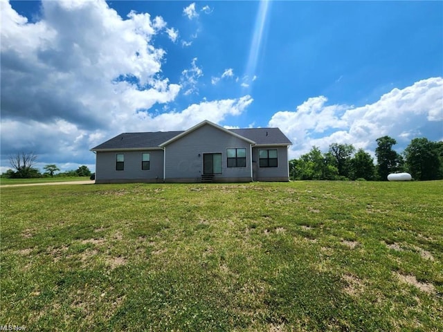 exterior space featuring a front lawn