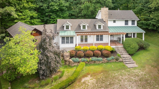 view of front facade with a front lawn and covered porch