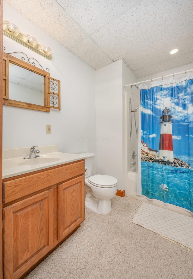 full bathroom featuring vanity, shower / bathtub combination with curtain, and toilet