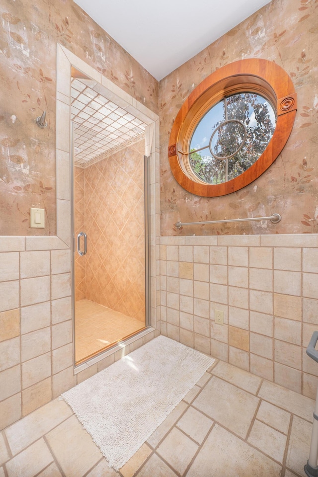 bathroom with tile walls