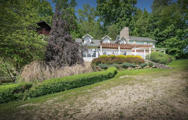 view of yard with a pergola