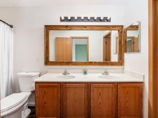 2124 Ripple Rd, Hilliard, OH 43026 - full bath featuring toilet and double vanity