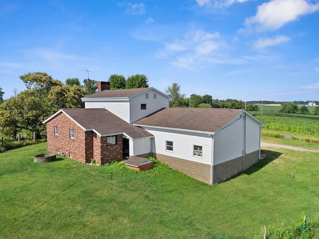 exterior space with a yard