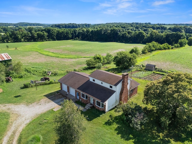 birds eye view of property featuring a rural view