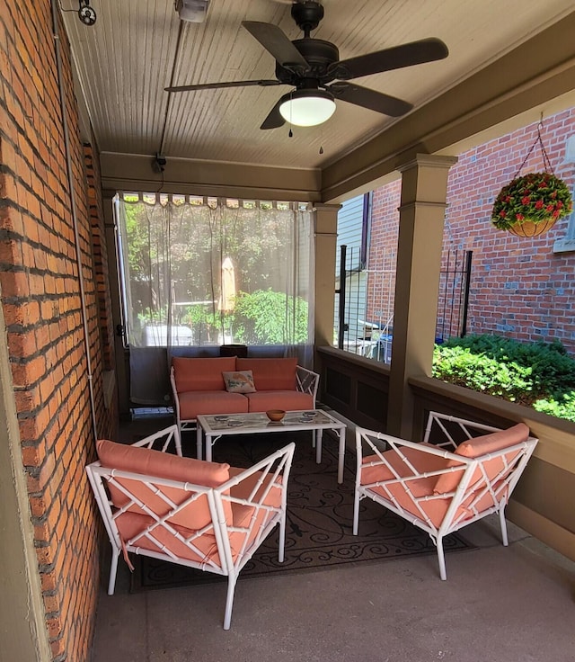 sunroom with ceiling fan and a healthy amount of sunlight