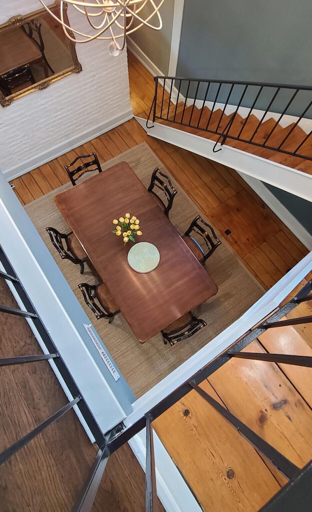 unfurnished dining area featuring hardwood / wood-style floors