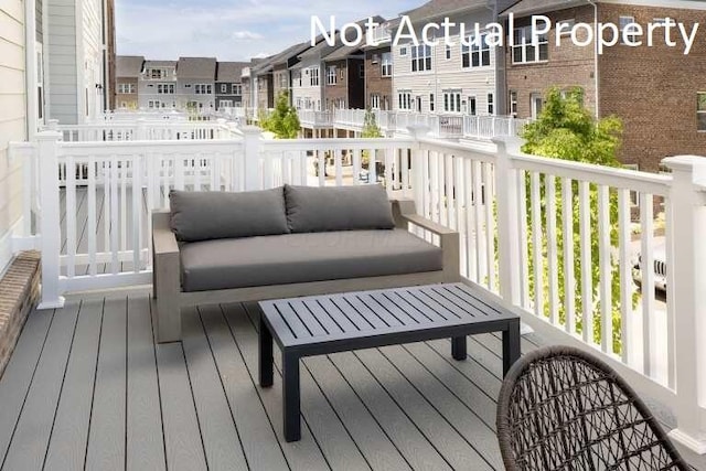 balcony with a residential view and outdoor lounge area