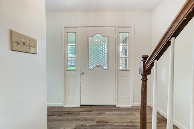 entrance foyer featuring hardwood / wood-style flooring