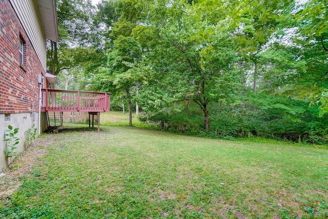 view of yard featuring a deck