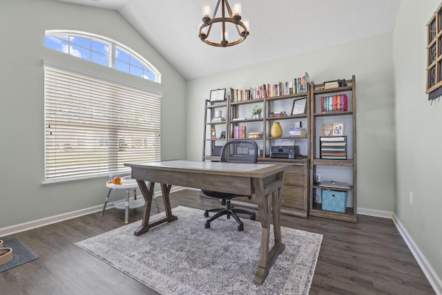 office featuring a textured ceiling, dark hardwood / wood-style floors, vaulted ceiling, and an inviting chandelier