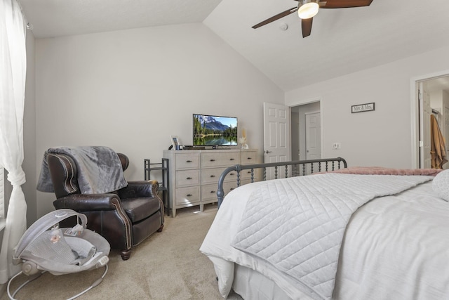 bedroom featuring ceiling fan, high vaulted ceiling, and light carpet