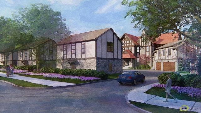 exterior space featuring driveway, an attached garage, and stucco siding