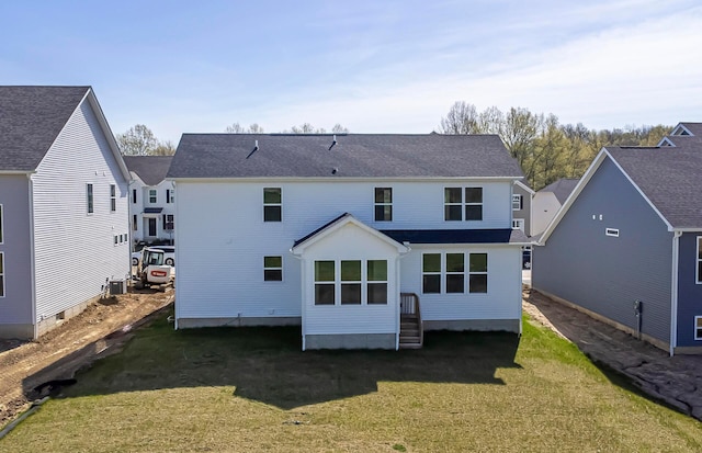 9931 Glenfield Ct Lot 37, Plain City, OH 43064 - rear view of house featuring a lawn
