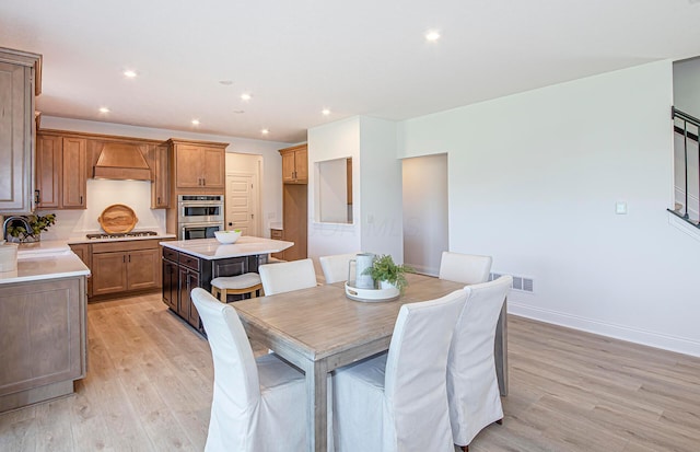 9931 Glenfield Ct Lot 37, Plain City, OH 43064 - dining area with baseboards, recessed lighting, and light wood-style floors
