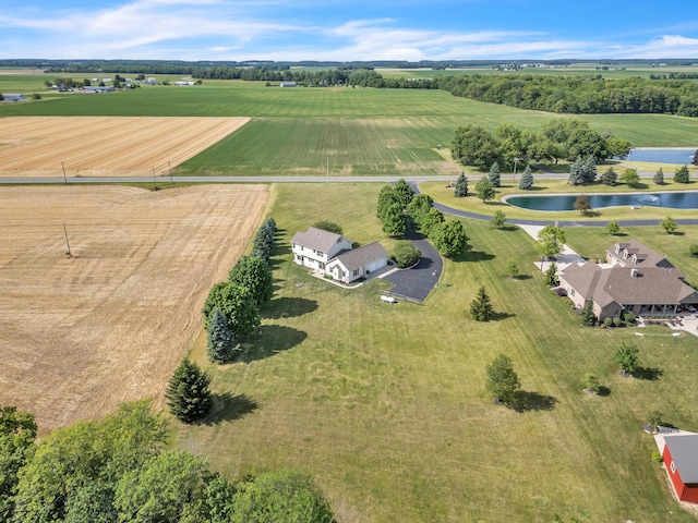 aerial view featuring a rural view and a water view