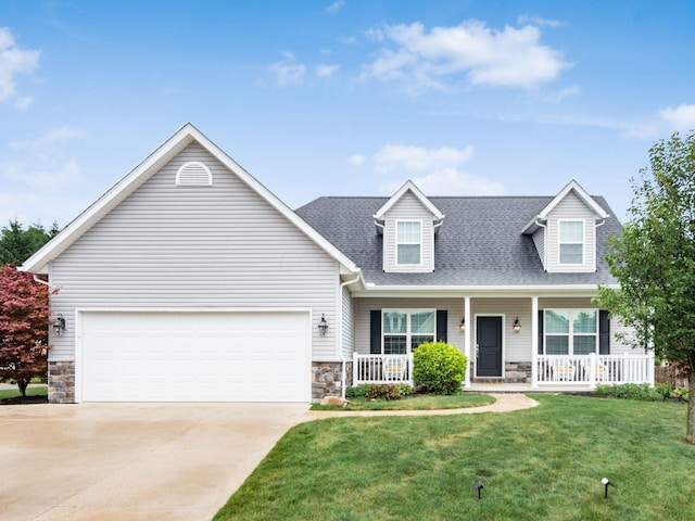 cape cod house with a garage, covered porch, and a front lawn