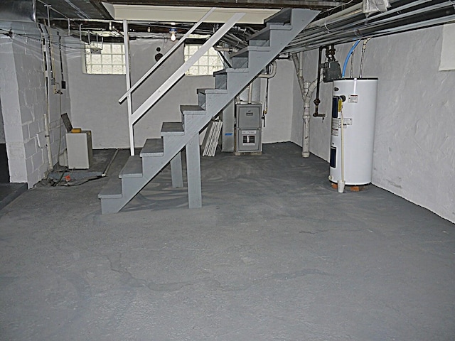 basement featuring electric water heater