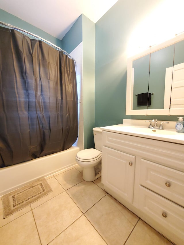 full bathroom with tile patterned floors, vanity, shower / bathtub combination with curtain, and toilet