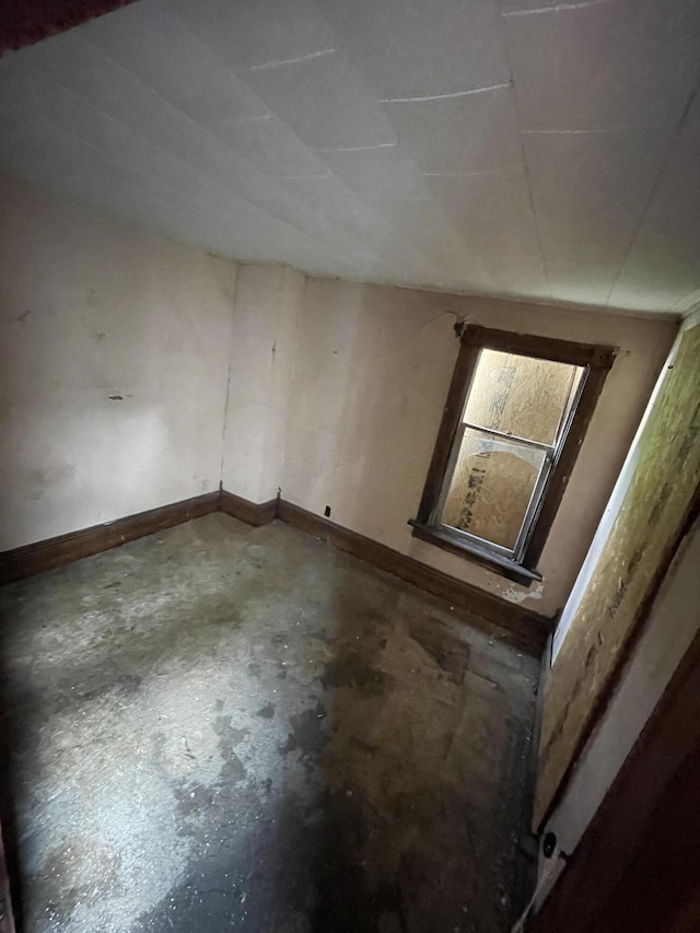 spare room featuring concrete floors