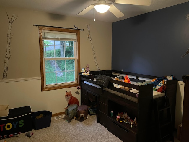 bedroom featuring carpet flooring and ceiling fan