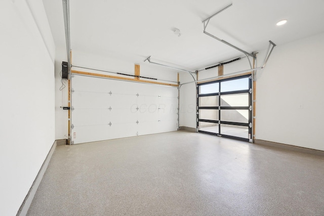garage with baseboards