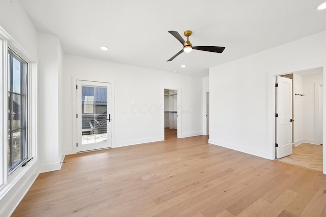 interior space with recessed lighting, multiple windows, and light wood-style flooring