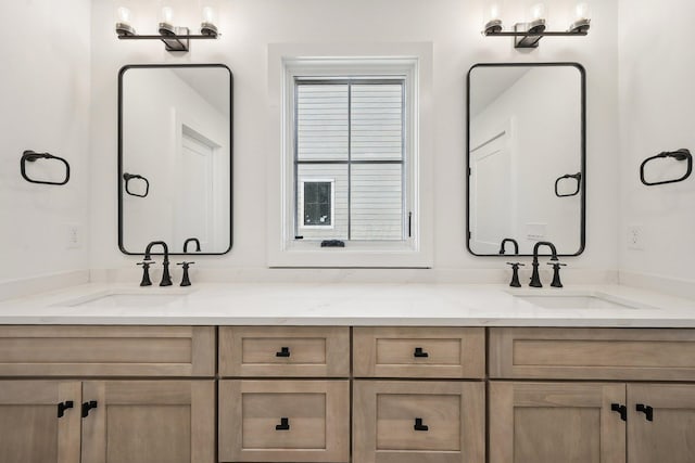 full bath featuring a sink and double vanity