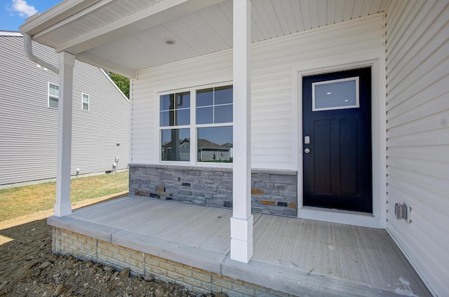 entrance to property with covered porch