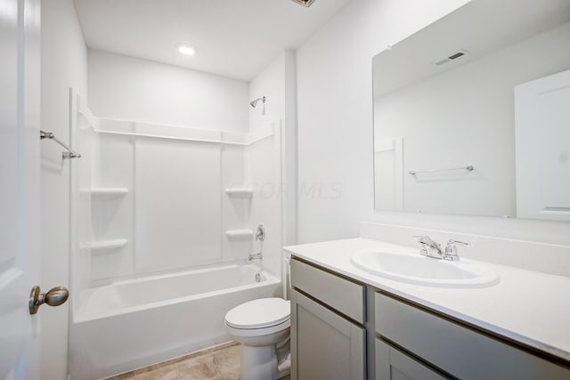 full bathroom featuring tile patterned floors, vanity, toilet, and bathing tub / shower combination