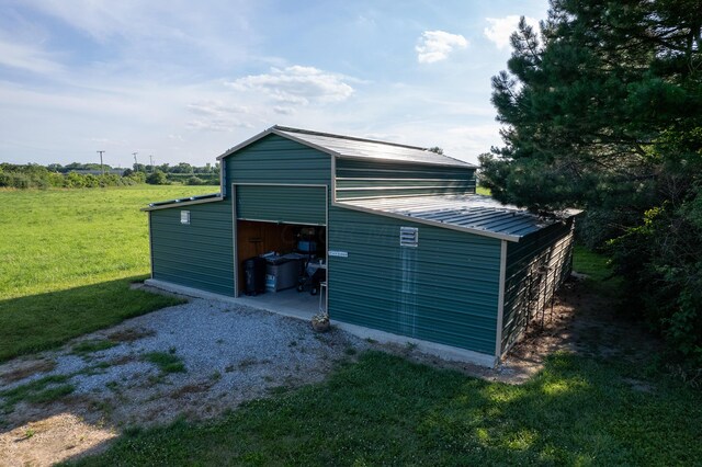 view of outdoor structure with a yard