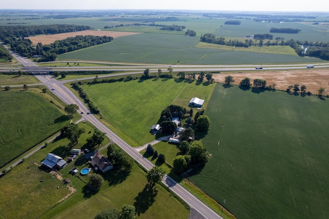 aerial view featuring a rural view and a water view