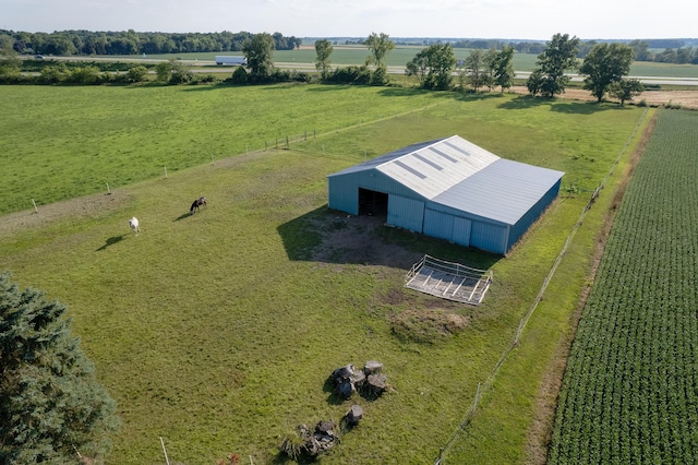 birds eye view of property featuring a rural view