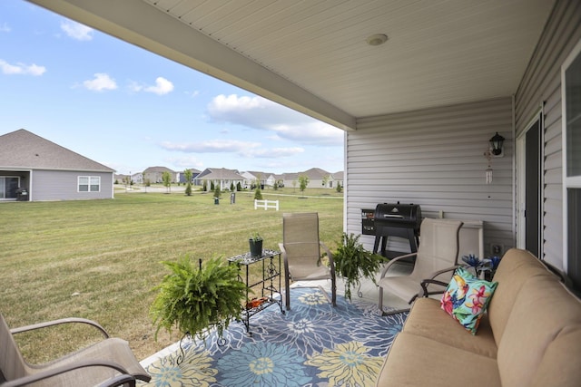 view of patio featuring a grill and an outdoor living space