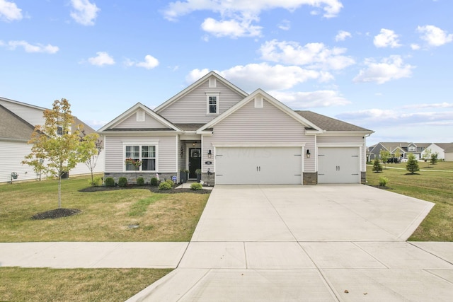 craftsman-style house with a garage and a front lawn